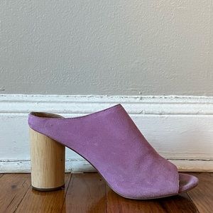 Purple shade mules with a cylindrical wooden heel